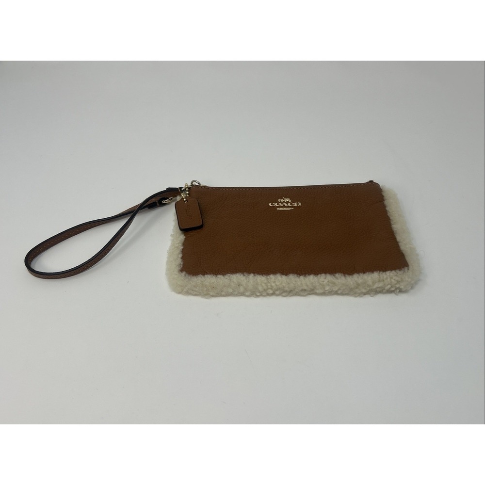 COACH Shearling Wristlet Saddle Tan Pebbled Leather w/ Natural Trim